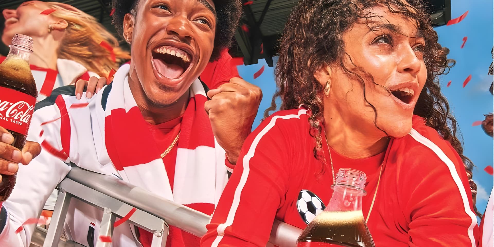 Fans celebrating with Coca-Cola